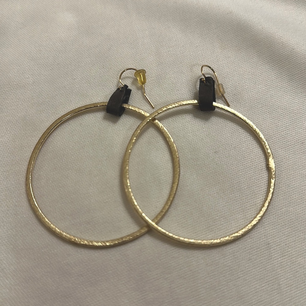 Gold hoops with leather accent